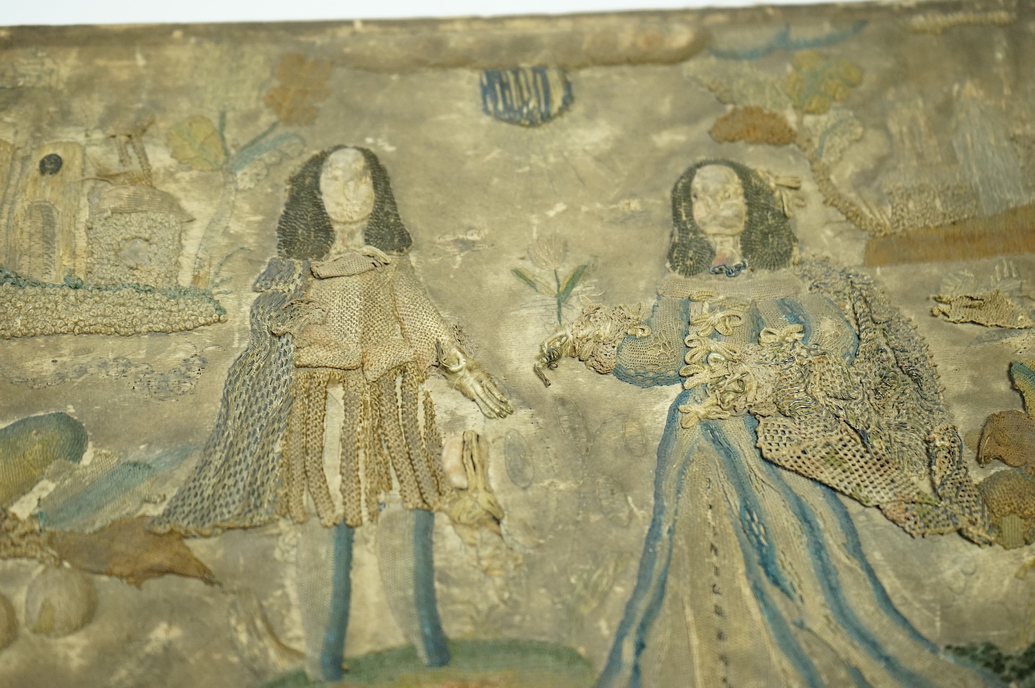 A late 17th century Charles II stump work box. The box originally embroidered to commemorate the marriage of Charles II to Catherine of Braganza in 1662. 31cm x 25.5cm deep., Condition - sadly during its 400 plus years o
